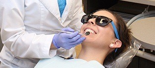 lady receiving dental exam
